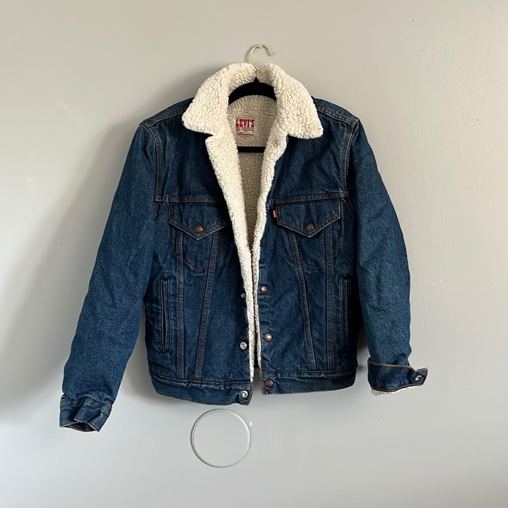 Levi’s vintage jean jacket with Sherpa lining. Buttons on back for custom sizing